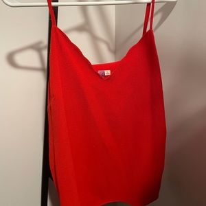 Scalloped red tank